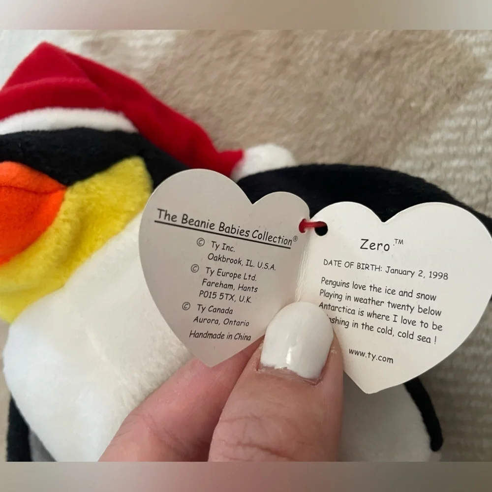 Ty Penguin Plush with Red Santa Hat named Zero 1998